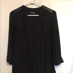 Woman’s black Express blouse